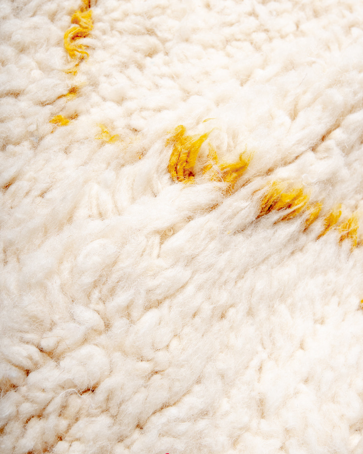 Modern, designer, handcrafted Berber rug from Morocco. Beniourain carpet with beautiful colours and patterns and fluffy wool texture.